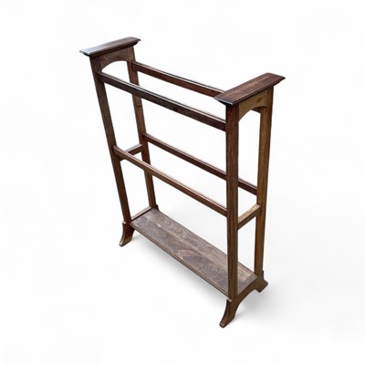Lot 5334 - Early 20th century oak towel rail.