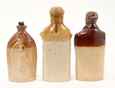 Lot 13 - Three salt glazed reform flasks including Mr and Mrs Caudle flask by Doulton and Watts, Greys Reform stoneware cordial bottle in the form of a politician holding The People's Rights Document, by...