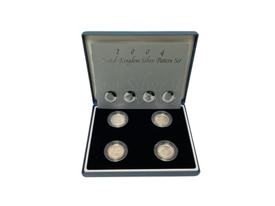 Lot 457 - G.B. - Royal Mint silver proof £1 coin sets to include UK pattern set 2004 & 30th Anniversary Royal Arms 2013 (2 coin sets)