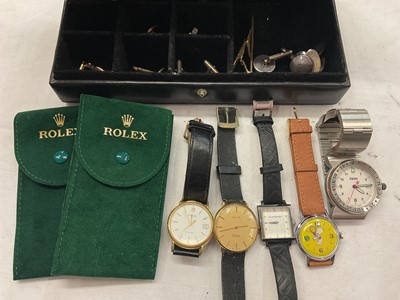 Lot 972 - Five wristwatches including a vintage Snoopy watch, Burberry, Tissot, Avia and Zippo, and various cufflinks and studs including silver