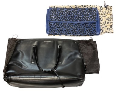 Lot 2553 - Gucci black leather tote handbag with soft dust bag and an embroidered leather clutch bag by Majorelle Gardens