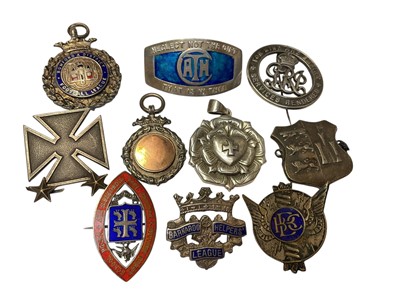 Lot 69 - Group of silver and white metal badges and fobs, some with enamelled decoration