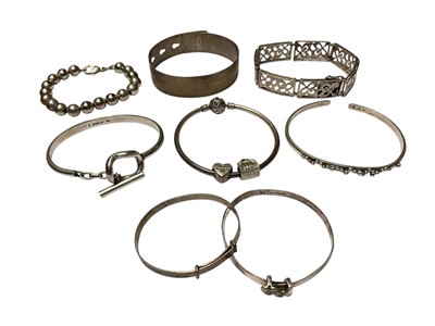 Lot 70 - Group of silver and white metal bangles and bracelets