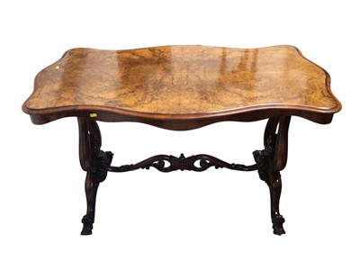 Lot 5337 - Good Victorian burr walnut serpentine shaped occasional table standing on end supports with carved centre stretcher