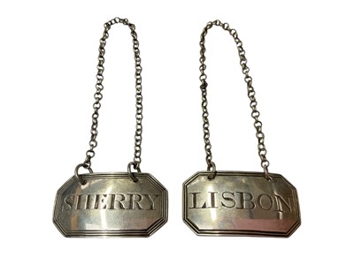 Lot 91 - Two Georgian silver spirit labels