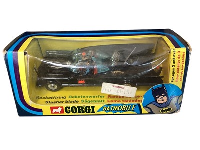 Lot 2013 - Corgi vintage (c1975) Batmobile (chips to paint) with Batman & Robin figures & rockets, window box No.267 (1)