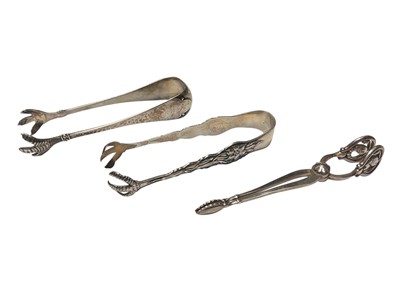 Lot 96 - Three pairs of silver sugar tongs