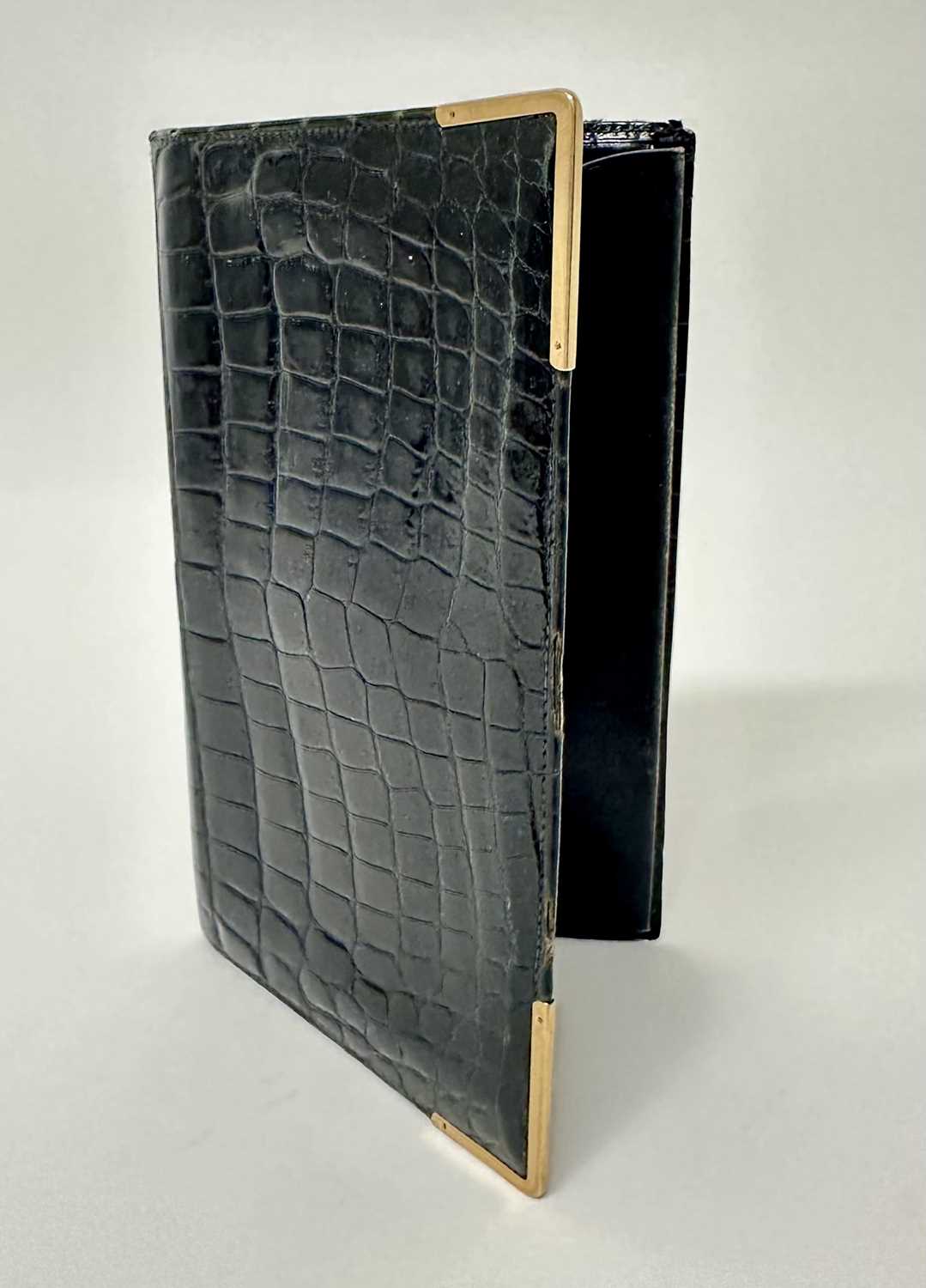 Lot 101 - Good quality 9ct gold mounted crocodile skin wallet