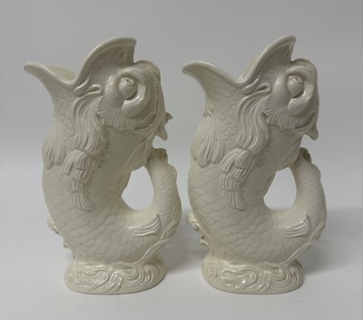 Lot 105 - Pair of Wedgwood of Etruria cream glazed fish gluggle jugs