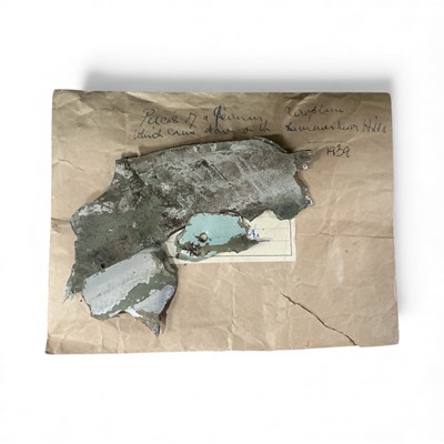 Lot 716 - Second World War interest- three metal fragments contained within a brown paper envelope inscribed "Pieces of a German aeroplane which came down on the Lammermoor Hills 1939"