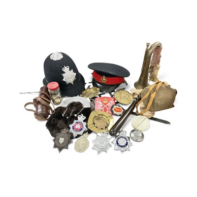 Lot 719 - Group of assorted militaria to include a bugle, lacquered brass spotting scope and other items including a Northumberland Police helmet and other police badges, (1 box).