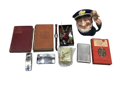 Lot 5188 - Royal Doulton character jug, books and group of virtu items.