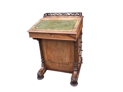 Lot 5377 - Victorian walnut Davenport with green leather top measuring 80cm tall