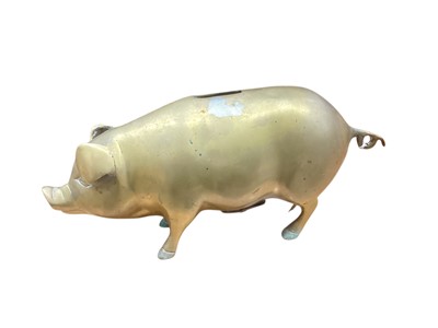 Lot 3039 - Antique money piggybank, 28cm in overall length.