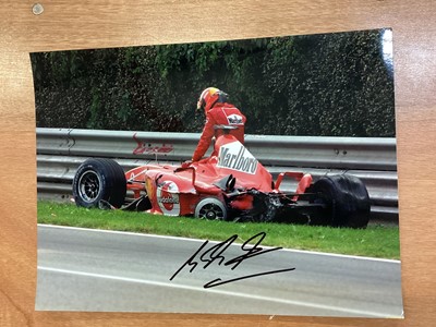 Lot 1140 - Two Michael Schumacher A3 hand signed pictures and hand signed Lewis Hamilton picture