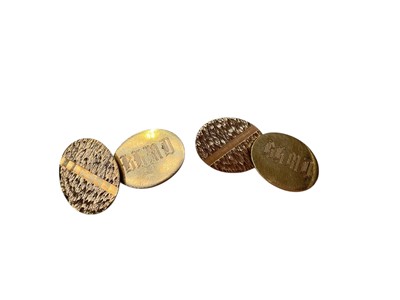 Lot 192 - Pair of 9ct gold oval panel cufflinks with engraved initials