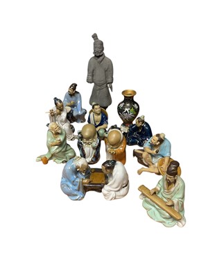 Lot 3112 - Collection of stone fruit and mud figures.