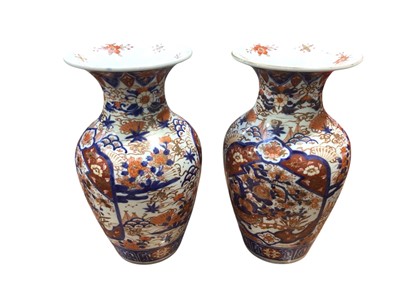 Lot 5093 - A pair of Imari style vases