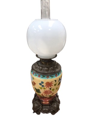 Lot 5013 - 19th century oil lamp with porcelain base measuring approximately 61cm tall
