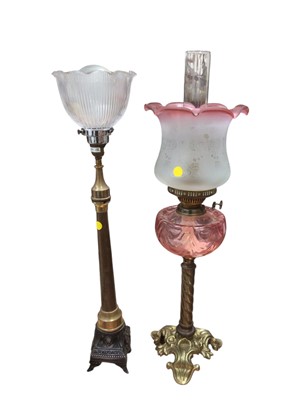 Lot 5014 - 19th century converted oil lamp with brass base measuring approximately 69cm tall together with one other