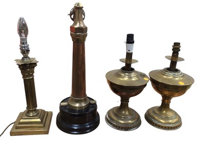 Lot 5015 - Two converted brass oil lamps together with two other lamps
