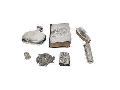 Lot 324 - Group of silver and white metal including a Victorian silver hipflask, silver cheroot holder containing a 9ct gold mounted amber cheroot, silver mounted Bible and other items