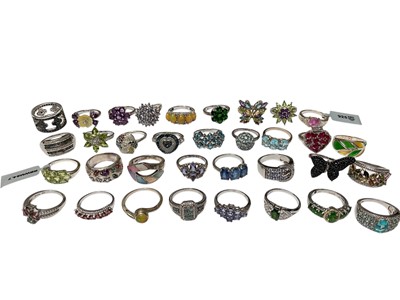Lot 127 - Collection of 34 contemporary silver multi-gem set dress rings