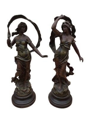 Lot 5043 - Pair of 20th century French bronzed spelter figures
