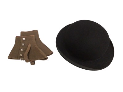 Lot 2567 - Vintage black Bowler hat by Devonia and a pair of spats.