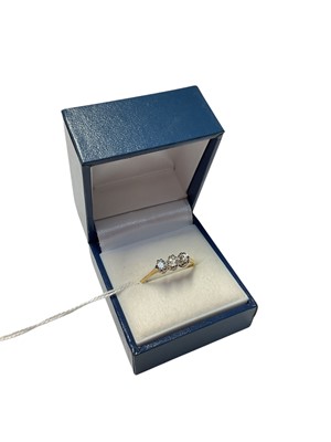 Lot 300 - Diamond three stone ring in 18ct gold setting