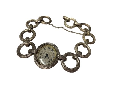 Lot 303 - 1970s Roy King silver wristwatch with circular links, in Roy King cardboard box with guarantee dated 3-5-77