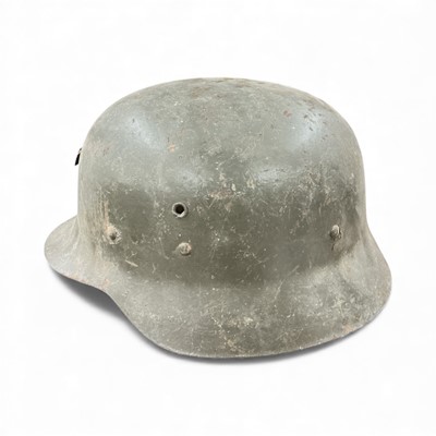 Lot 738 - Second World War Nazi German M42 pattern steel helmet, with original painted finish and leather liner.