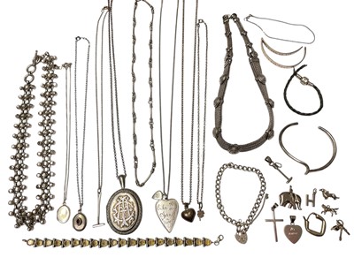 Lot 182 - Group of silver and white metal jewellery including a Victorian locket pendant on chain, various other pendants, charms, chains, citrine bracelet etc