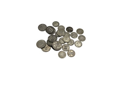 Lot 492 - World - Mixed coins to include a small quantity of silver G.B. silver Threepences x 89 & other issues (Qty)