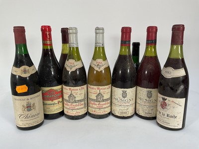 Lot 19 - Nine bottles of wine including: Chablis Grand Cru 1988, Musigny 1986, Clos de L'Oratoire des Papes 2008, Chateau de Riviere Chinon 1987, half bottle of Chateau Bourgneuf 1959 and others