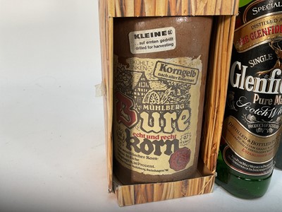 Lot 37 - Two bottles, Glenfiddich Pure Malt Scotch Whisky, 75cl., 40%, in Clan Macpherson tin and a bottle of Burekorn, boxed