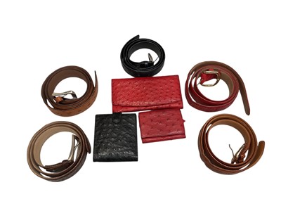 Lot 2564 - Group of ostrich leather accessories including a Leone black leather wallet, Leone red leather purse and similar key wallet, unnamed, together with five ostrich leather belts