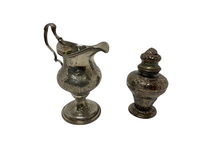 Lot 263 - George II silver cream jug and a Continental silver castor. (2)