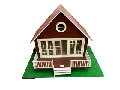 Lot 1946 - Dolls House Haberdashery shop with counters and contents, display cabinets, accessories etc. Also chalet style doll summer house wooden construction with a quantity of furnishings, accessories...