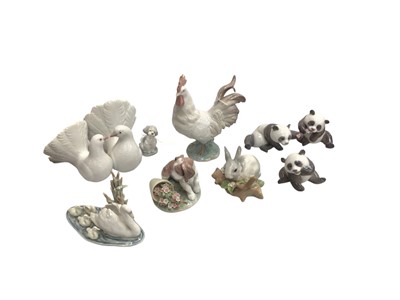 Lot 2342 - Nine Lladro porcelain animals including Rooster, Couple of Doves, three Pandas etc