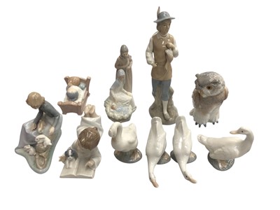 Lot 2343 - Collection of ten Nao porcelain figures and animals including Joseph, Mary and Baby Jesus