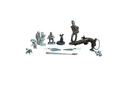 Lot 2986 - Contemporary silver trowel book mark, (Birmingham 1985) together with another similar and group of pewter figures.