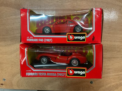 Lot 2105 - Burago 1:24 scale Ferraris, Jaguar, Mercedes and other sports cars, in window boxes (11)
