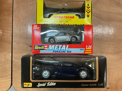 Lot 2106 - Maistp 1:18 scale Jaguar XJ200 and Maisto, Revell, Majorette 1:24 scale sports cars, in window boxes (12)