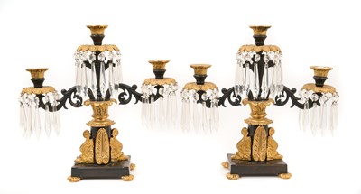 Lot 805 - Pair of Regency bronze candlesticks
