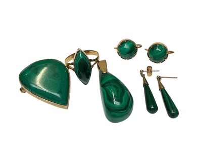 Lot 234 - Group of malachite jewellery in yellow metal mounts to include a ring, pendant, brooch and two pairs of earrings