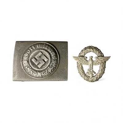 Lot 758 - Nazi German Police Officers belt buckle, together with a Police Visor Cap badge, (2).