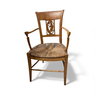 Lot 5360 - Charming 19th century Continental country armchair with carved monkey in tree decoration to the splat and rush seat