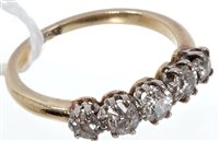 Lot 544 - Edwardian diamond five stone ring with five...