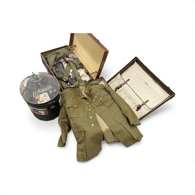 Lot 776 - Group of assorted 1950's / 60's Royal Artillery military uniforms to include two suitcases of various jackets, trousers, Sam Browne belt and other items, together with a japanned tin hat box nam...